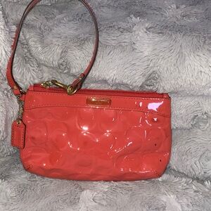 Coach Glossy Coral Wristlet